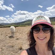 roni near a white horse