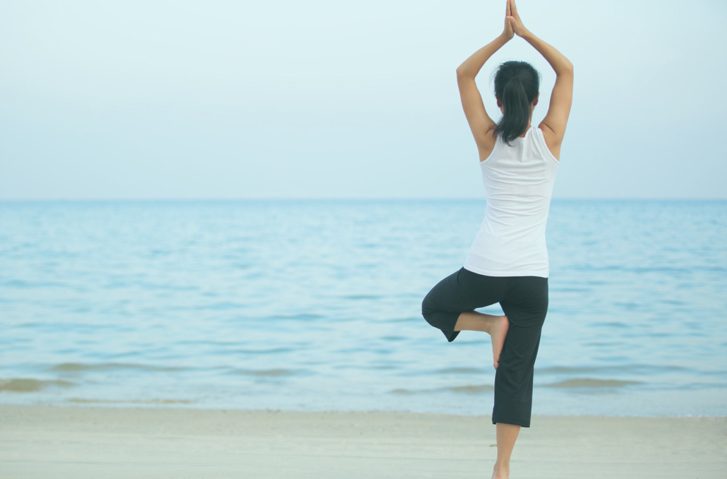 yoga practice by the beach