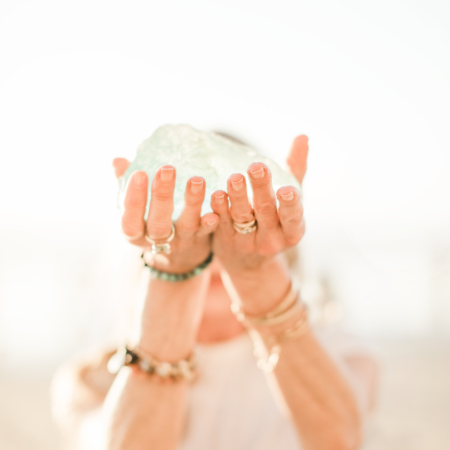 holding a crystal