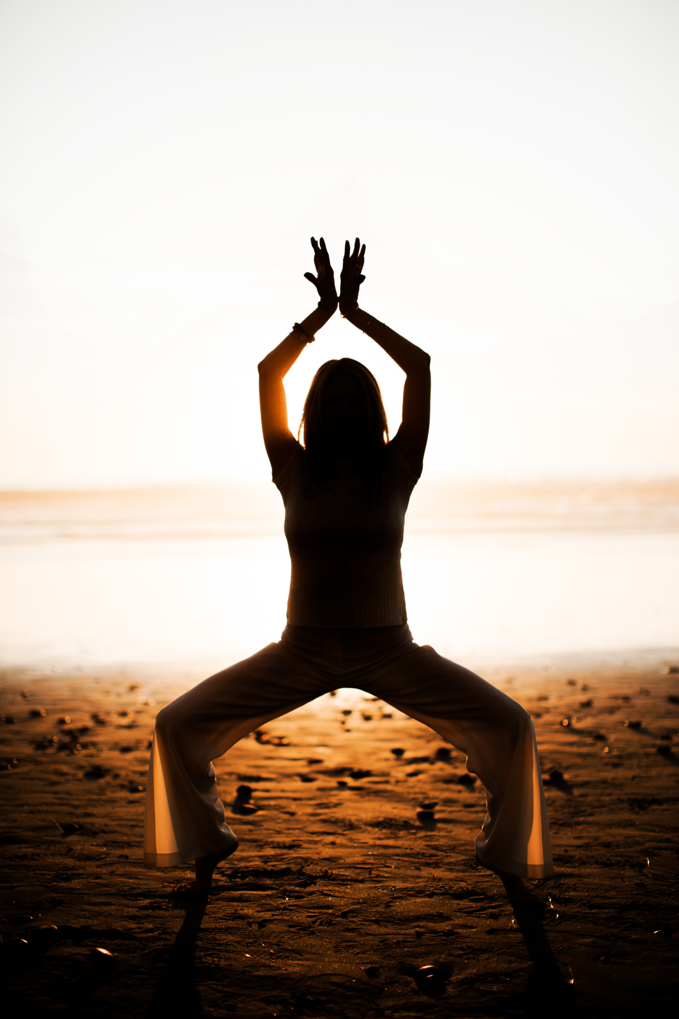 yoga pose at sunset