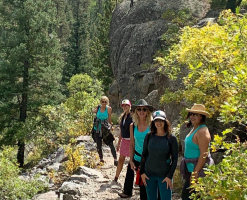 yoga attendees having a blast while hiking