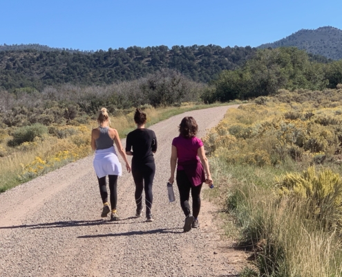3 yoga woman on a hike